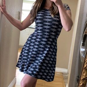 Blacked skater dress with cross back!